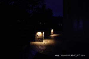 Under railing LEDs on seating wall.