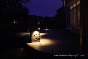 Under railing LEDs on seating wall.