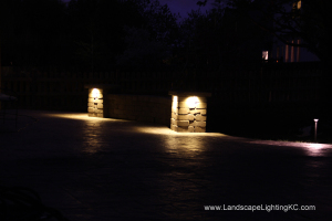 Under railing LEDs on seating wall.