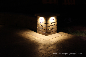 Under railing LEDs on seating wall.